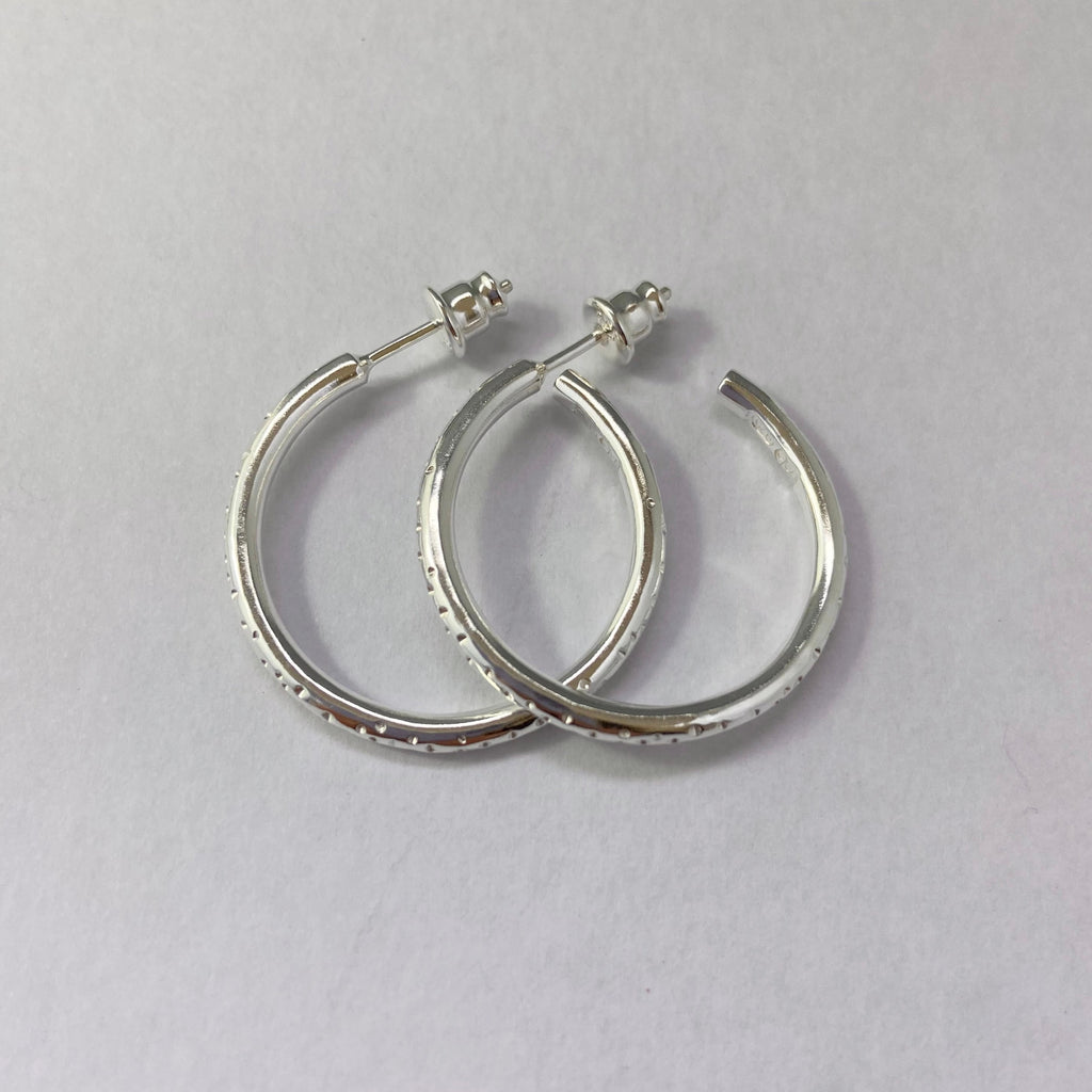 Example of sterling silver earring backs on sterling silver hoop earrings
